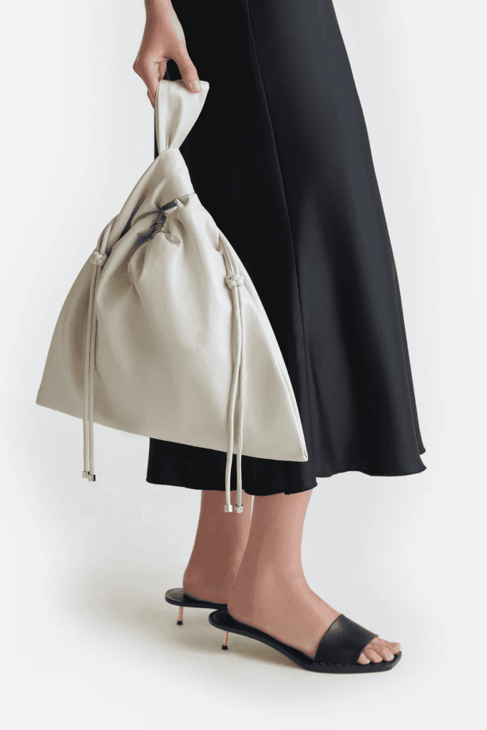 Lush Collective | Jen Drawstring Large Okoborâ„¢ Alt-Leather Bag from Nanushka
