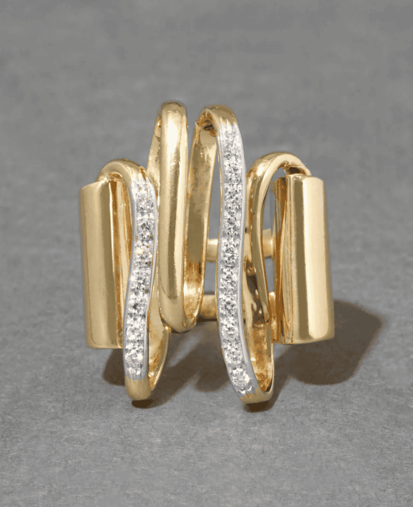 Luxury gold and diamond statement ring, modern jewelry design, elegant gold accents and sparkling stones, unique artisan crafted jewelry, stylish accessory for special occasions.