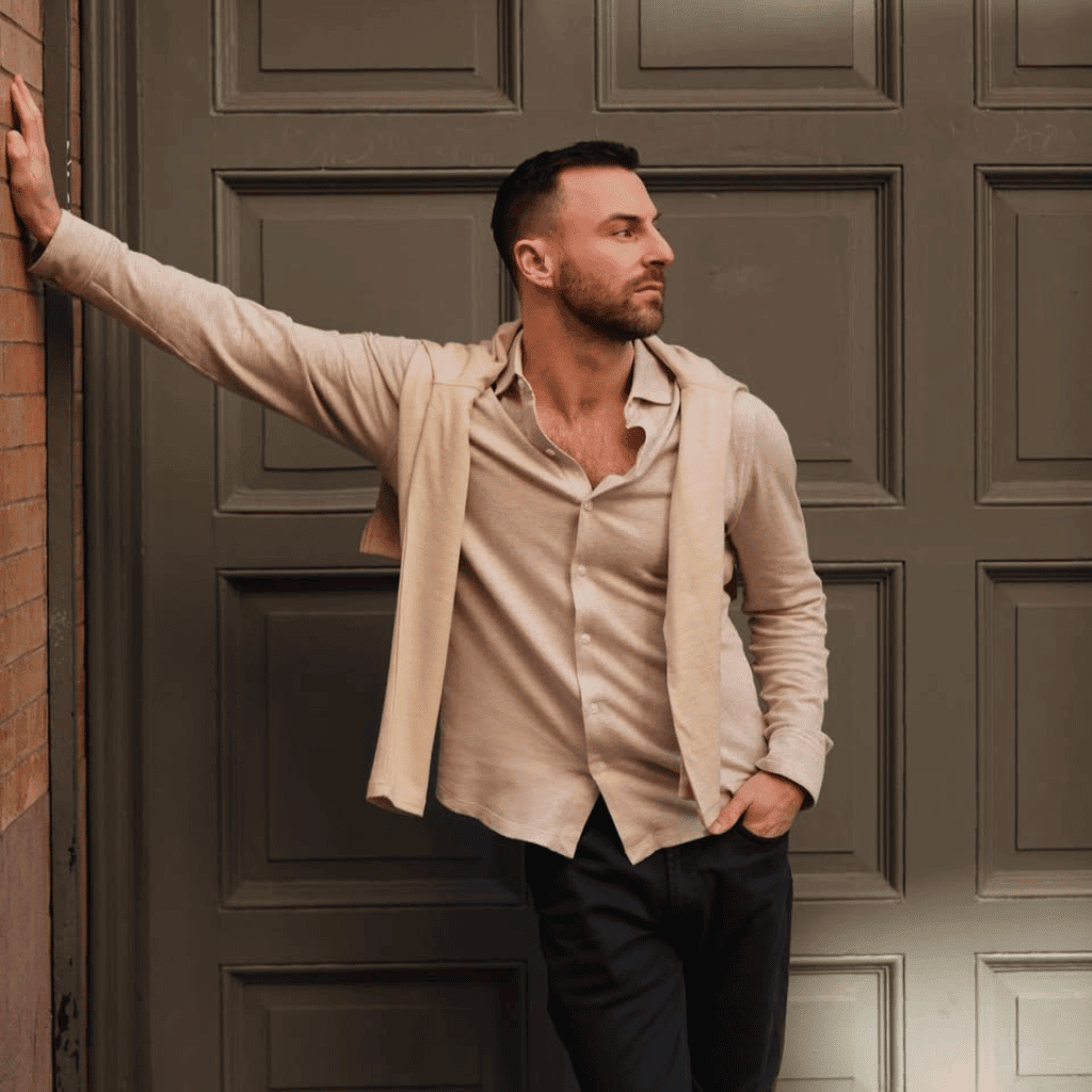 Men fashion beige shirt and black pants stylish casual menswear for modern men.