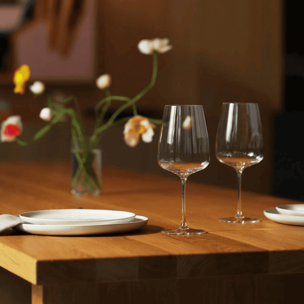 Elegant glassware and table setting for a cozy dinner at Lush Collective.