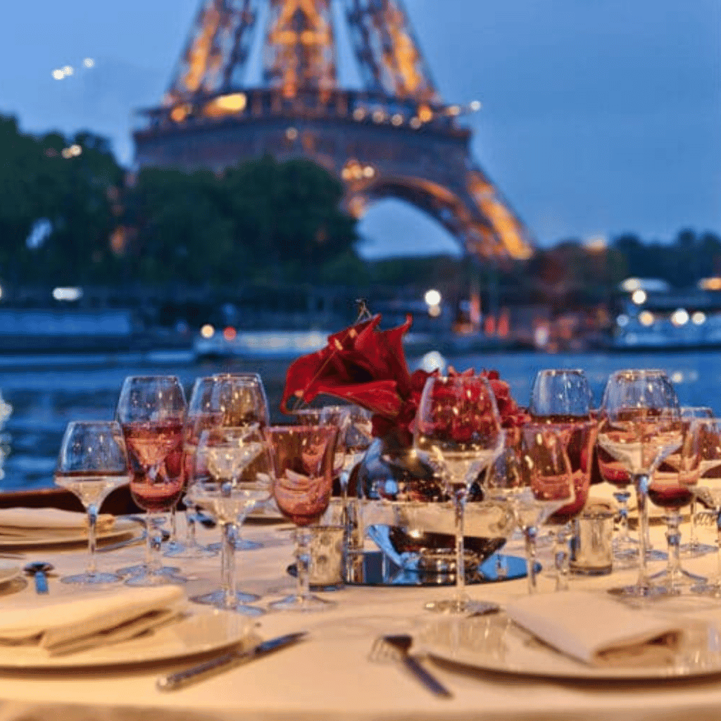 Elegant dining setup with Eiffel Tower view in Paris, perfect for romantic dinners and special events.