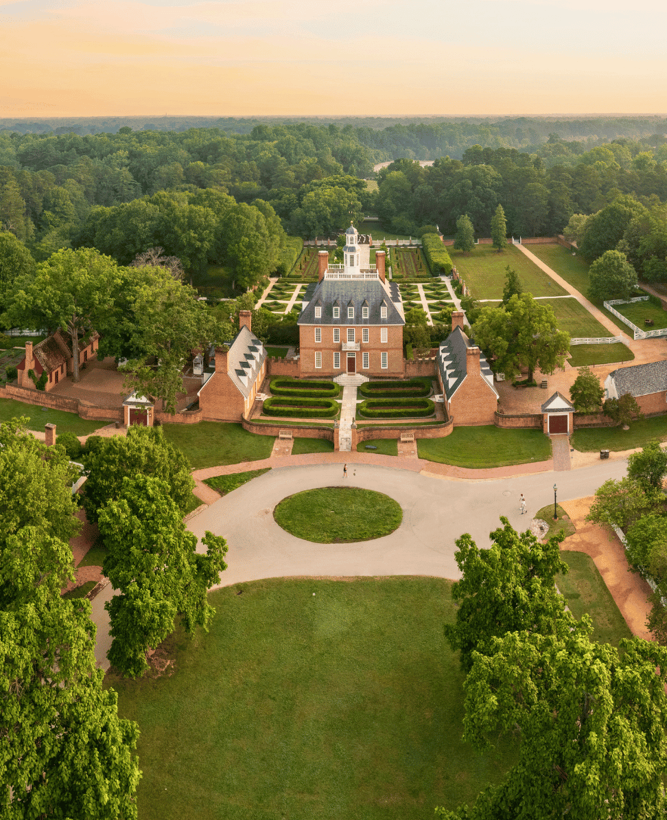 Lush Collective estate with historic architecture and manicured gardens, ideal for luxury events and gatherings.