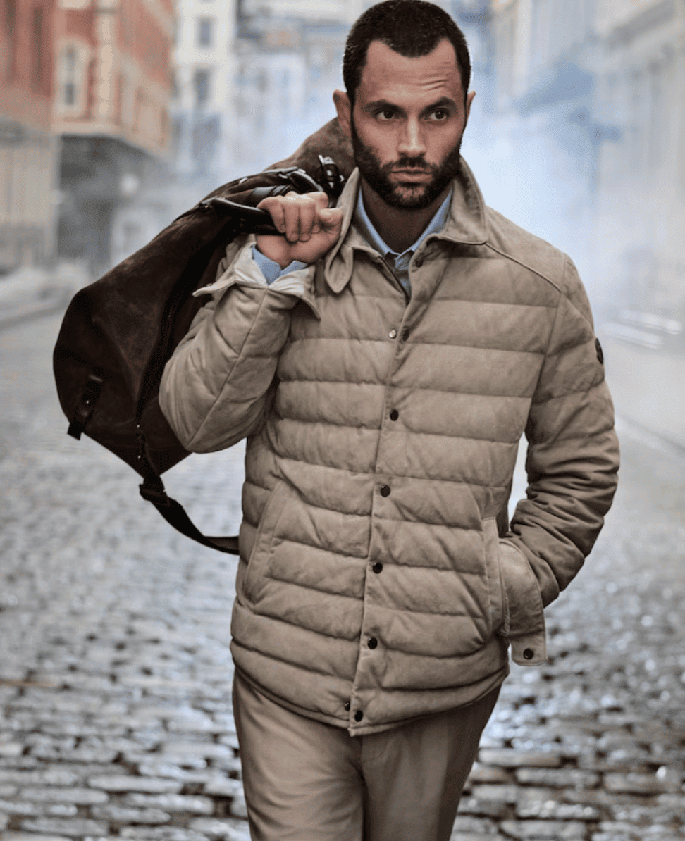 Puff insulated jacket man walking city street winter outdoor warm clothing.